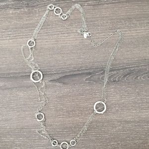 Silver necklace with triple strands and circles